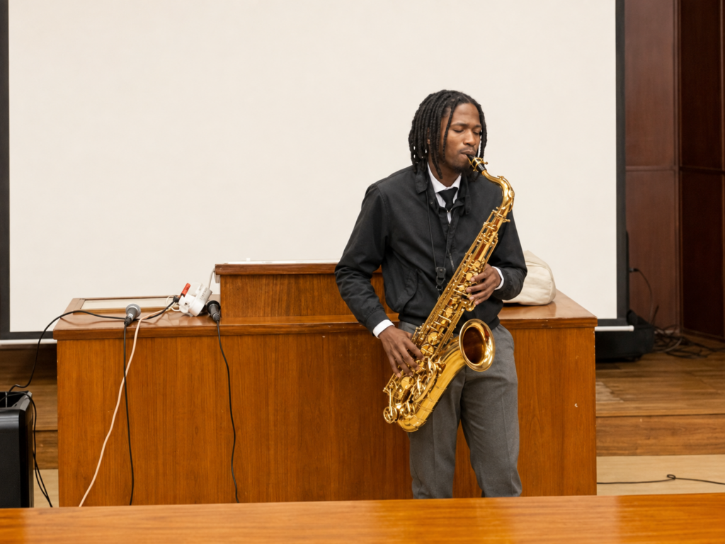 Khumo playing an instrument